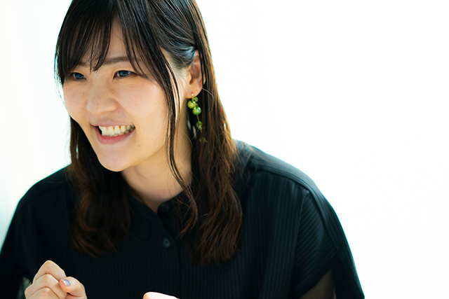 Miho Matsumoto smiling as she talks about her work