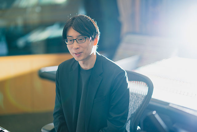 笑顔で語る横田林三